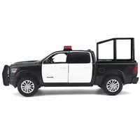 2019 RAM 1500 LARAMIE CREW CAB PICKUP TRUCK WITH BED CAGE BLACK AND WHITE WITH FLASHING LIGHT BAR AND FRONT AND REAR LIGHTS AND SOUNDS 1/24-1/27 DIECAST MODEL CAR BY MOTORMAX