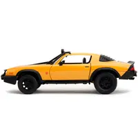 1977 CHEVROLET CAMARO OFF-ROAD VERSION "BUMBLEBEE" YELLOW METALLIC WITH BLACK STRIPES AND TRANSFORMERS LOGO DIECAST STATUE "TRANSFORMERS: RISE OF THE BEASTS" (2023) MOVIE "HOLLYWOOD RIDES" SERIES 1/24 DIECAST MODEL CAR BY JADA