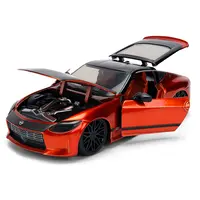 2023 NISSAN Z ORANGE METALLIC WITH CARBON HOOD AND BLACK TOP "JDM TUNERS" SERIES 1/24 DIECAST MODEL CAR BY JADA