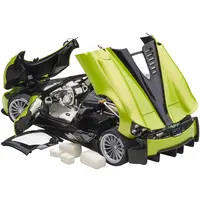 PAGANI HUAYRA ROADSTER VERDE FIRENZE GREEN METALLIC AND CARBON WITH LUGGAGE SET 1/18 MODEL CAR BY AUTOART