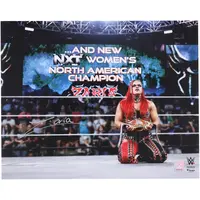 ZARIA WWE AUTOGRAPHED 16" X 20" RAISING NXT WOMEN'S NORTH AMERICAN TITLE PHOTOGRAPH