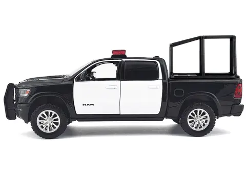 2019 RAM 1500 LARAMIE CREW CAB PICKUP TRUCK WITH BED CAGE BLACK AND WHITE WITH FLASHING LIGHT BAR AND FRONT AND REAR LIGHTS AND SOUNDS 1/24-1/27 DIECAST MODEL CAR BY MOTORMAX