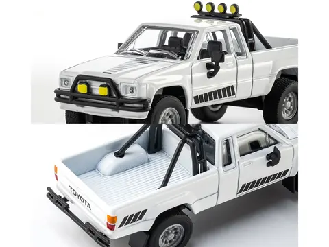 1985 TOYOTA HILUX SR5 PICKUP TRUCK WHITE WITH BLACK GRAPHICS "COLLECTION" SERIES 1/64 DIECAST MODEL CAR BY MAJORETTE