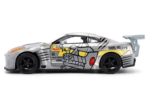 2009 NISSAN GT-R (R35) BEN SOPRA BRUSHED METAL WITH BLACK TOP AND GRAPHICS AND MECHAGODZILLA DIECAST FIGURE "GODZILLA" FRANCHISE "ANIME HOLLYWOOD RIDES" SERIES 1/24 DIECAST MODEL BY JADA