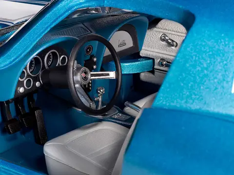1967 CHEVROLET CORVETTE STINGRAY LIGHT BLUE METALLIC WITH WHITE HOOD STRIPE "AMERICAN MUSCLE" SERIES 1/18 DIECAST MODEL CAR BY AUTO WORLD