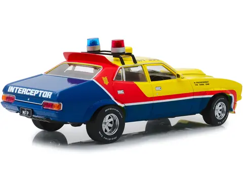 1974 FORD FALCON XB 4-DOOR SEDAN RHD (RIGHT HAND DRIVE) YELLOW AND BLUE WITH RED STRIPES "MFP 508" "FIRST OF THE V8 INTERCEPTORS" (1979) MOVIE 1/18 DIECAST MODEL CAR BY GREENLIGHT