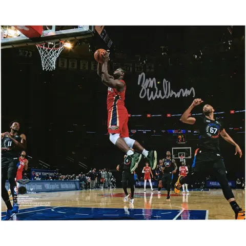 ZION WILLIAMSON NEW ORLEANS PELICANS AUTOGRAPHED 8" X 10" GOING UP VS. NEW YORK KNICKS PHOTOGRAPH